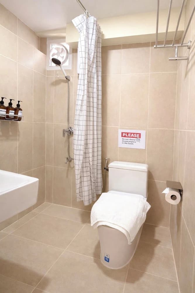 Raised toilet seat