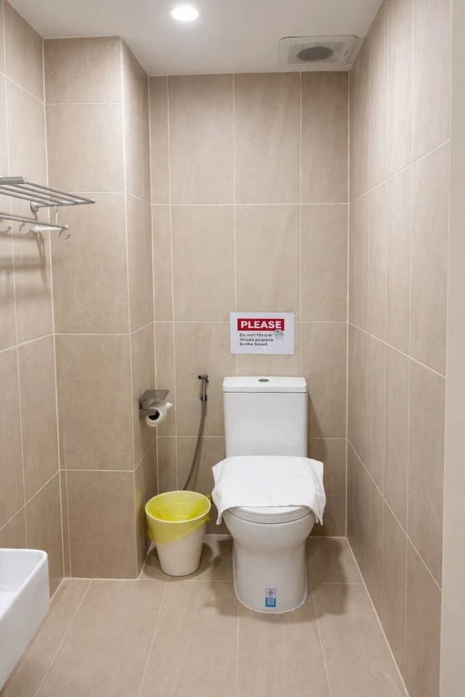 Raised toilet seat