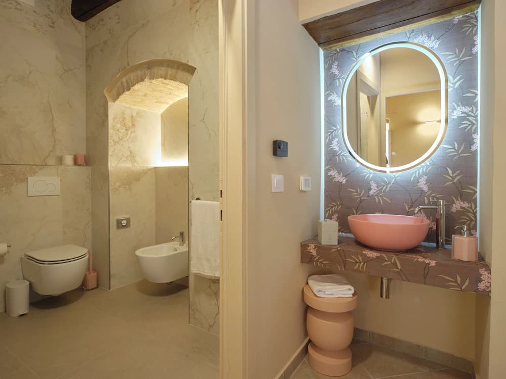 Raised toilet seat