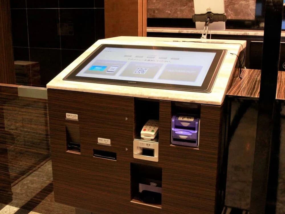 Check-in/check-out kiosk
